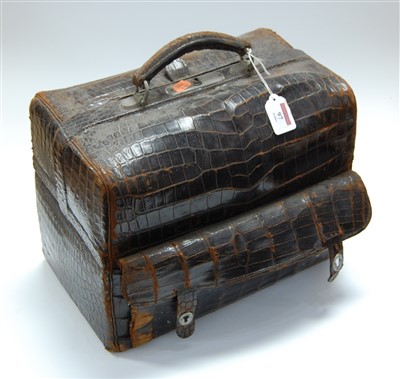 Lot 97 - A Victorian crocodile skin travel case, the...