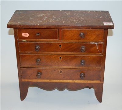 Lot 134 - A mahogany apprentice piece chest of two short...