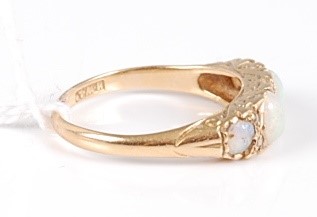 Lot 305 - An 18ct gold, opal and diamond set ring,...