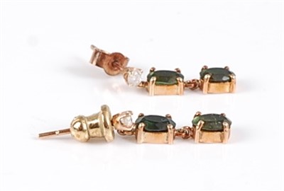 Lot 310 - A pair of yellow metal green tourmaline and...
