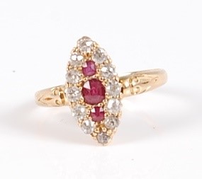 Lot 326 - An 18ct gold, ruby and diamond dress ring, the...