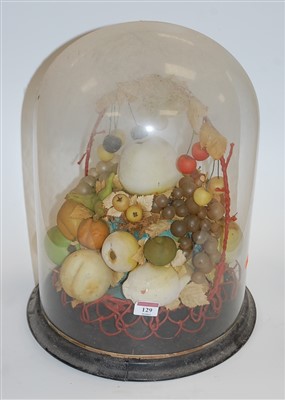 Lot 129 - A Victorian waxed fruit display beneath glass...