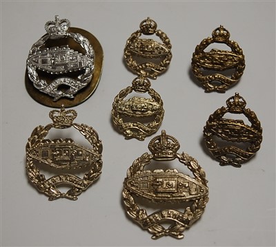 Lot 262 - A collection of Royal Tank Corps cap badges...