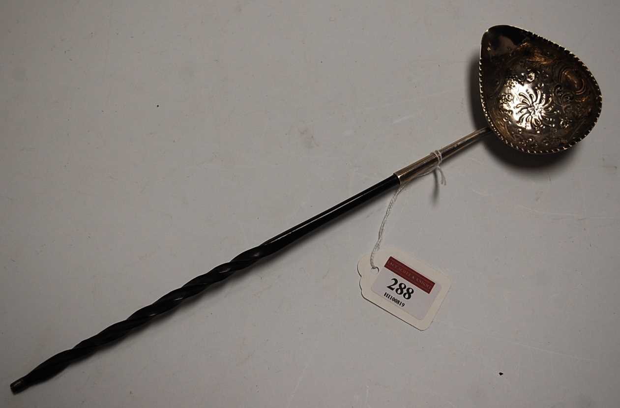 Lot 288 - A George III silver toddy ladle, the bowl...