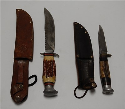 Lot 347 - A Bowie type knife having a double edged blade,...