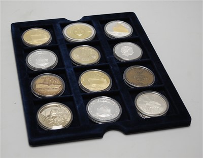 Lot 376 - A collection of coins, to include HMS Titanic...