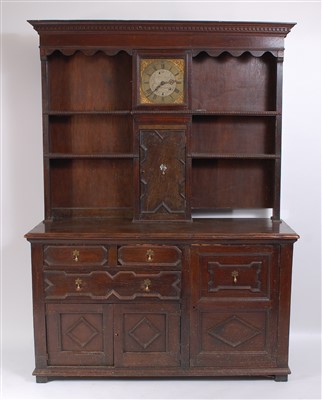 Lot 1498 - An antique oak house-keepers dresser, the...