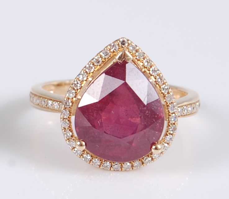 Lot 1215 - A yellow metal pear shaped ruby and diamond...