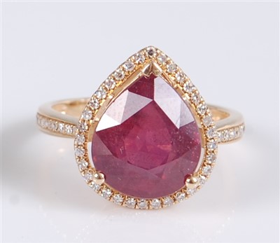 Lot 1215 - A yellow metal pear shaped ruby and diamond...