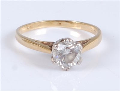 Lot 1231 - An 18ct yellow and white gold single stone...
