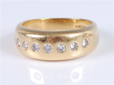 Lot 1229 - An 18ct yellow gold seven stone diamond Gypsy...