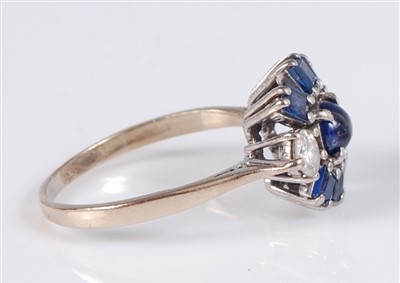 Lot 1213 - A yellow and white metal, sapphire and diamond...