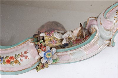 Lot 2025 - A 19th century German porcelain wall mirror,...