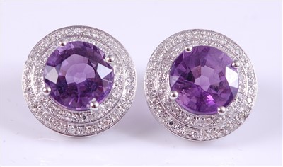 Lot 1216 - A pair of white metal, amethyst and diamond...