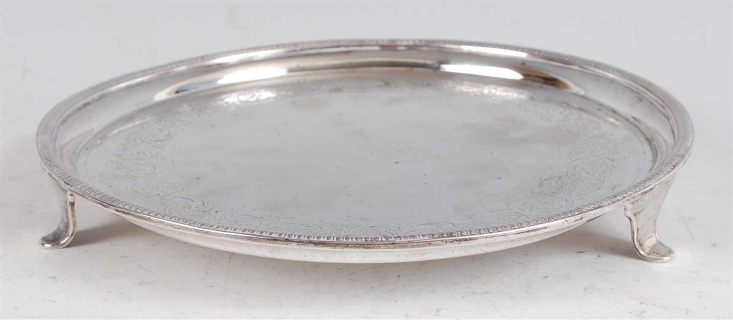 Lot 1138 - A George III silver salver, having a gadrooned...