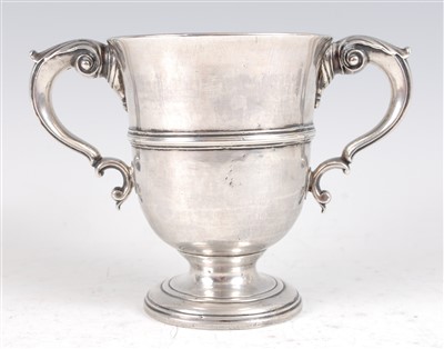 Lot 1063 - A George II Irish silver loving cup, having...
