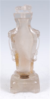 Lot 1310 - A Chinese carved rock crystal vase and cover...