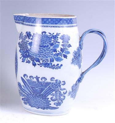 Lot 1313 - A Chinese export blue and white water jug,...