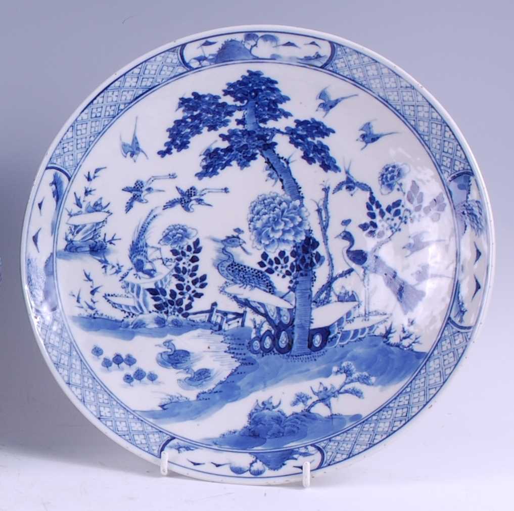 Lot 1316 - A Chinese export blue and white shallow bowl,...