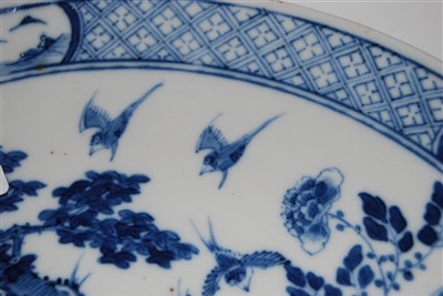 Lot 1316 - A Chinese export blue and white shallow bowl,...