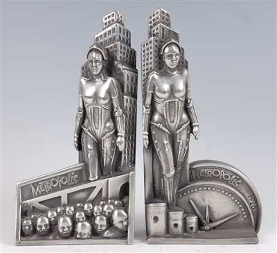 Lot 628 - A pair of Compulsion Sculpture pewter resin bookends