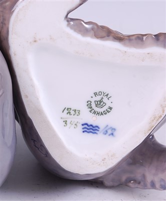 Lot 57 - A Royal Copenhagen porcelain model of a seated...