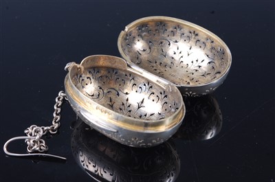 Lot 1130 - A Victorian silver pomander, of pierced oval...