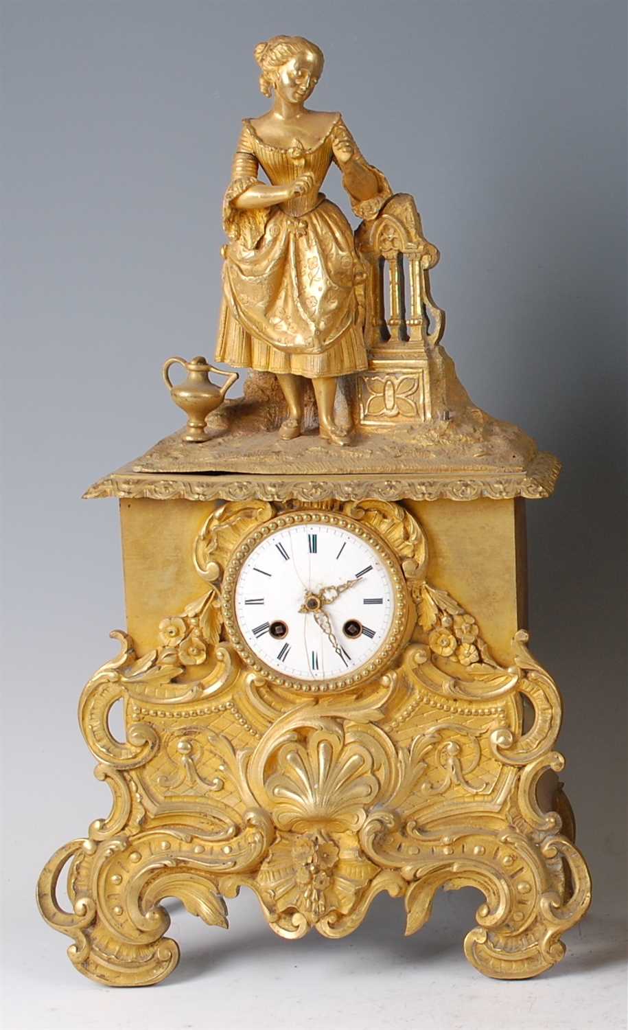 Lot 1383 - A mid-19th century gilt bronze mantel clock,...