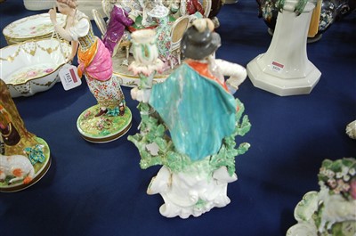 Lot 1022 - A Derby porcelain bocage candle-holder figure...