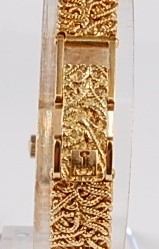 Lot 1251 - An 18ct yellow gold lady's Tissot manual wind...