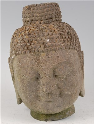 Lot 1328 - A Chinese(?) stone head of Buddha, carved in...