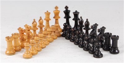 Lot 1298 - A 20th century turned boxwood and ebony chess...