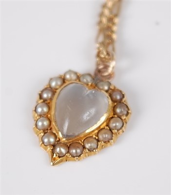 Lot 1221 - A moonstone and seed pearl heart shaped...