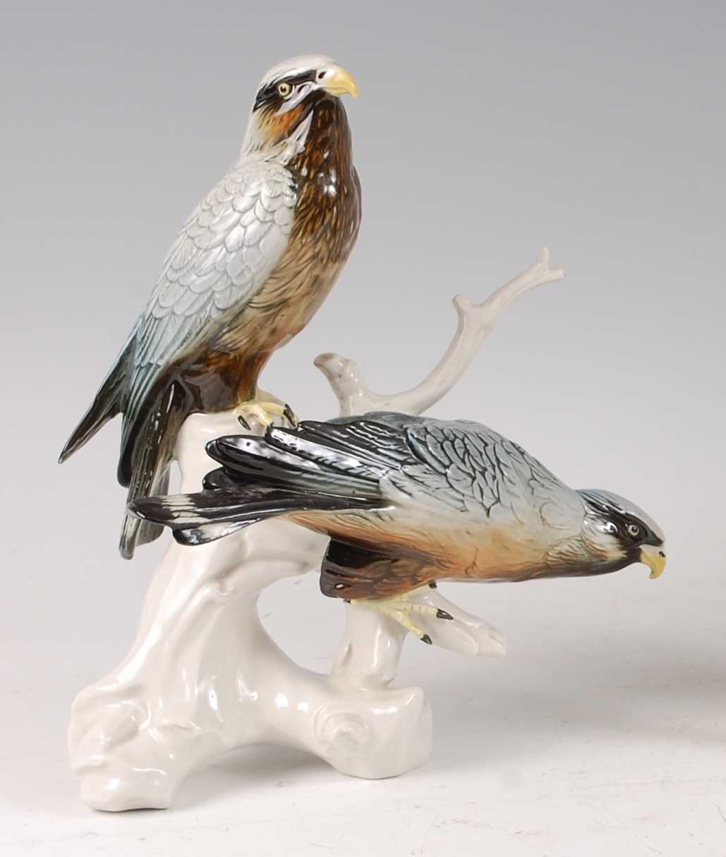 Lot 133 - Karl Ens - a pair of porcelain Falcons, each...