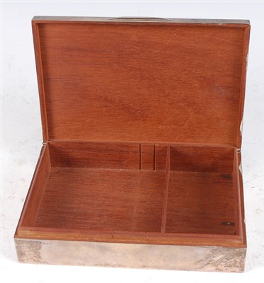 Lot 238 - An Art Deco style silver table cigarette box,...