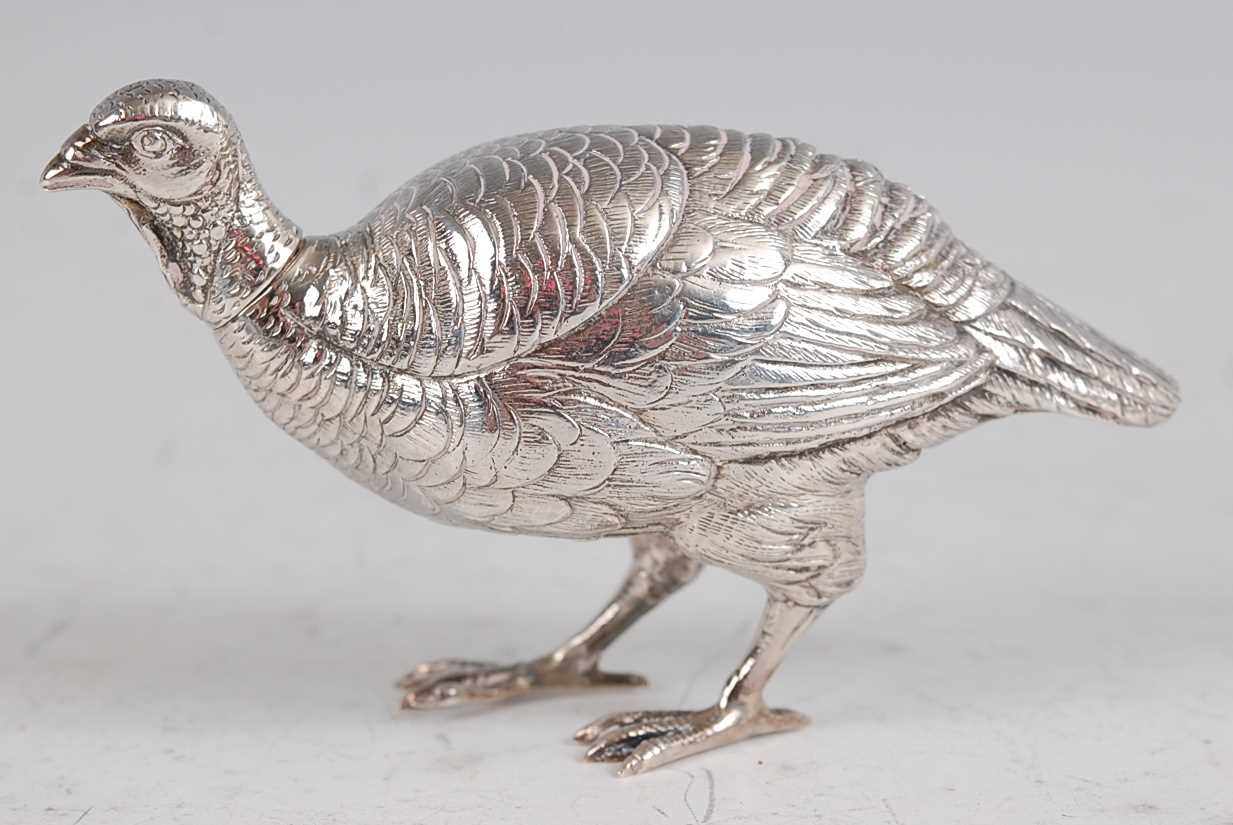 Lot 1099 - A silver grouse, with detachable head and...