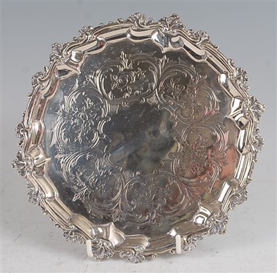 Lot 1106 - A mid-Victorian silver card waiter, having a...