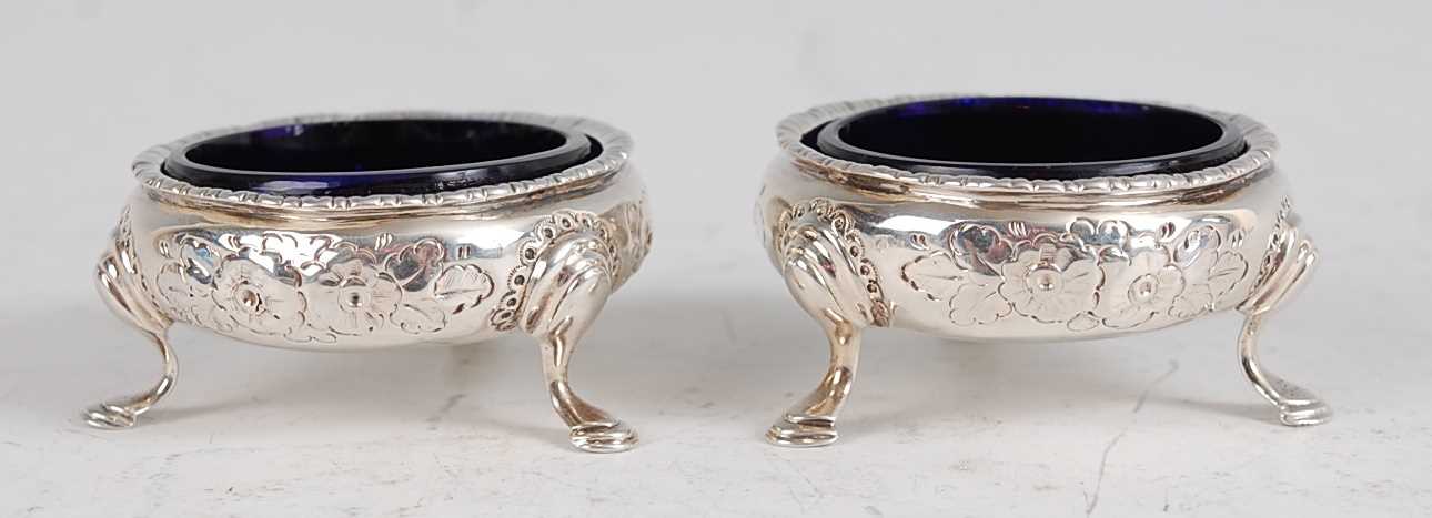 Lot 1104 - A pair of early George III silver table salts,...