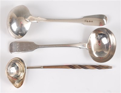 Lot 1073 - A late Georgian silver sauce ladle, in the...