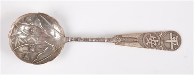 Lot 1322 - A Japanese Meiji period white metal spoon, the...