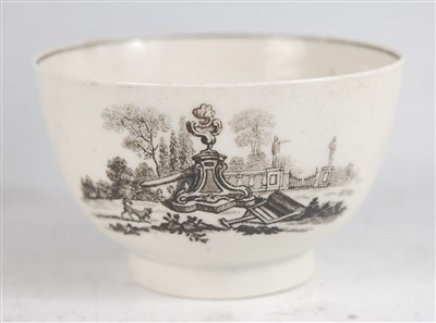 Lot 1029 - An 18th century porcelain tea bowl on stand,...