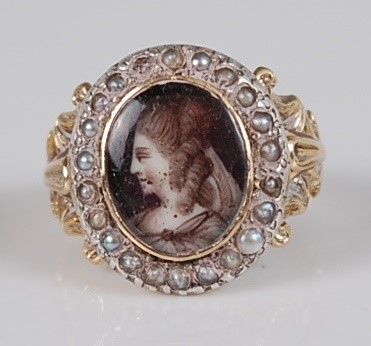 Lot 1201 - A George III yellow metal and seed pearl...