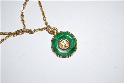 Lot 1222 - A Chinese yellow metal and jade necklace,...