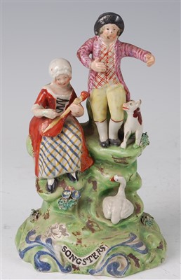Lot 1044 - An early 19th century Walton pearlware figure...