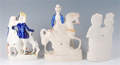 Lot 1052 - A Victorian Staffordshire figure group of a...