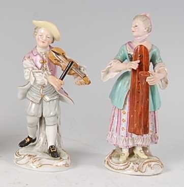 Lot 1096 - A near-pair of Meissen porcelain musician...