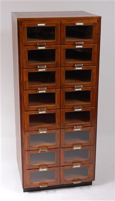 Lot 428 - An Art Deco oak narrow haberdashery cabinet,...