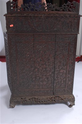 Lot 1504 - A 19th century Anglo-Burmese carved hardwood...