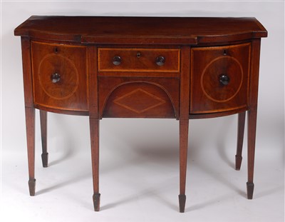 Lot 1450 - A George III mahogany bow and break-front...