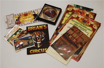 Lot 371 - A collection of circus related items, to include leaflets, ephemera, photographs, BT phone cards, a ticket book and a paperweight